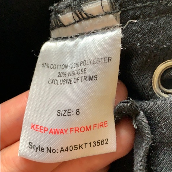 Black skirt with tied up sides - Picture 3 of 3